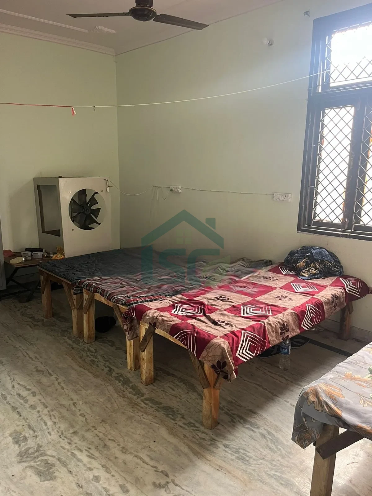 At Sher Singh PG, Sector 19, Faridabad